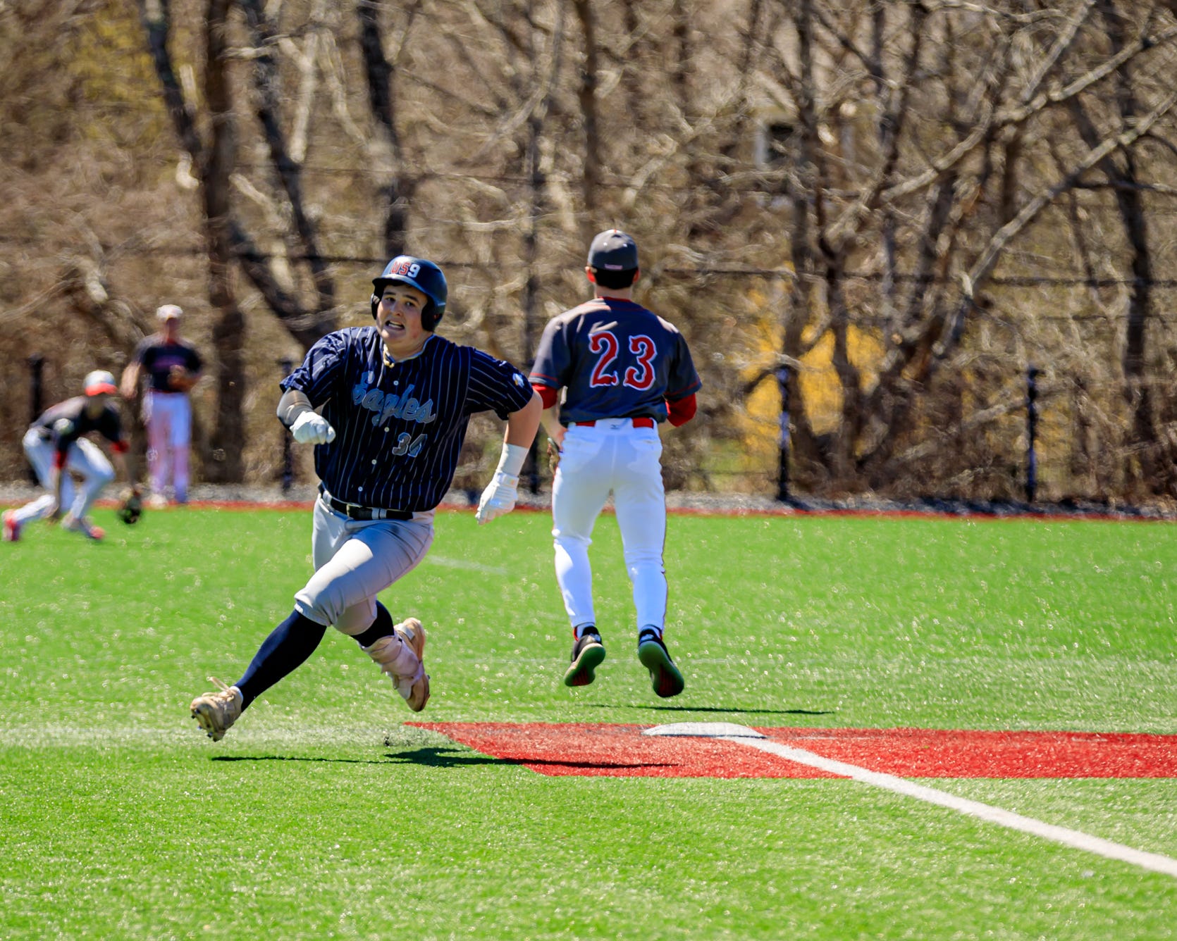 George Slauson rounds second base as he heads to third.